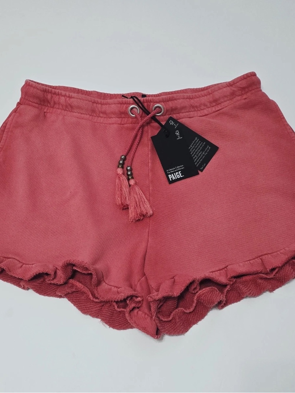 PAIGE Coral Pink Ruffle-Hem Athletic Shorts